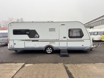 Knaus Royale 580 ~ Extra velká postel