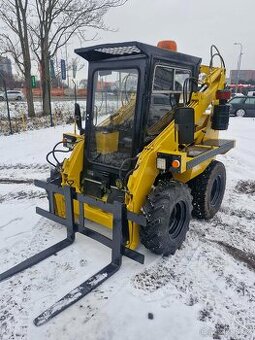 UNC 060 - Smykový nakladač