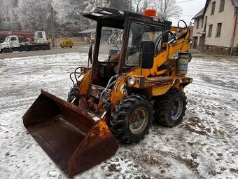 nakladač UNC 060 - 1