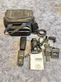 Nikon D5100 + Objektiv 18-105mm + Nissin blesk + brašna