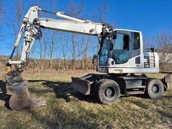 Kolový bagr Komatsu