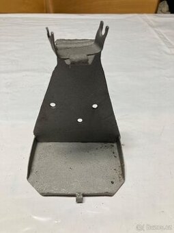 Držák baterky a pojistky asi trial nebo sport