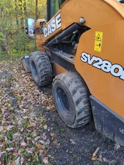 Smykový nakladač 12-16.5