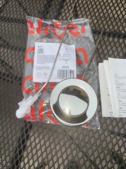 Umyvadlová výpusť zavírána tahlem Grohe