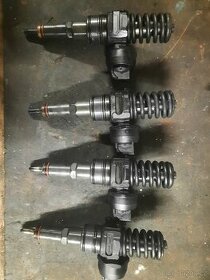 vstriky bosch 038 130 073BCB skoda vw 2.0tdi 100kw - 1