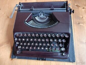 2 x PŘEDVÁLEČNÉ PSACÍ STROJE s kufříky+páska  navíc