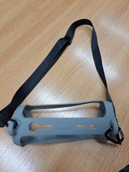 JBL popruh-pouzdro v šedé barvě