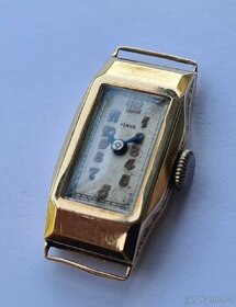 Dámské zlaté náramkové hodinky 14K

