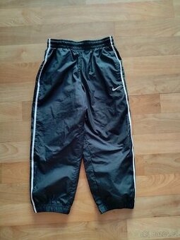 Šusťákové kalhoty NIKE, vel. 104 / 110