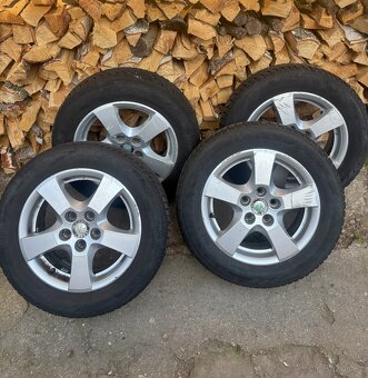 Litá kola se zimními pneu (185/60 R14)