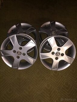 Alu kola Mazda 4x108 6jx15 ET 52.5