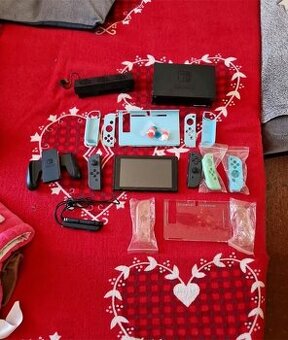 Nintendo Switch plus příslušenství a hry