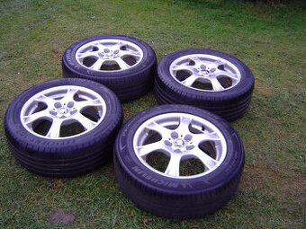 4XLETNÍ HLINÍKOVÁ KOLA ŠKODA OCTAVIA III,II 205/55 R16....