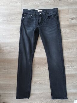 Nové pánské džíny Calvin Klein, vel. 33