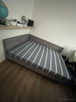 Rohová čalouněná postel s úložným prostorem