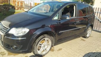Touran 2.0tdi 7 mist - 1