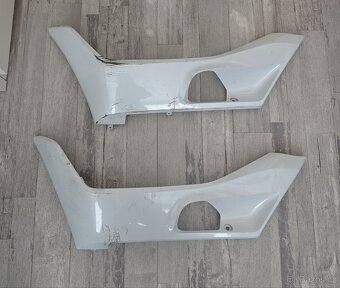 DOLNÍ JE PRYČ Levý boční spodní plast Honda PCX 18-20