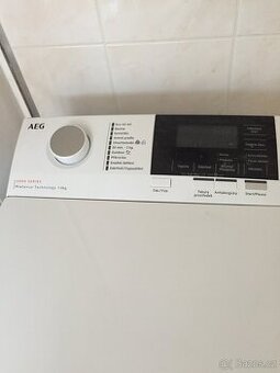 Pračka AEG, horní plnění, 1-6kg, zánovní stav