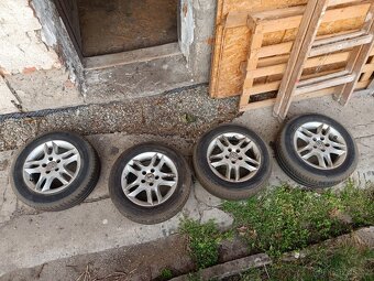 ALU kola 5x100 R14 pneu 185/65 R14 volkswagen polo