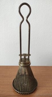 Pletací doplněk.