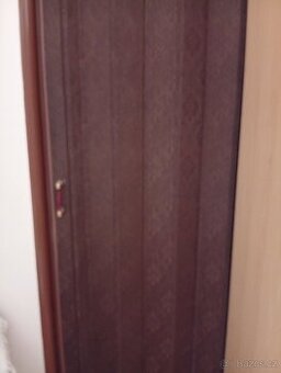 Shrnovací dveře