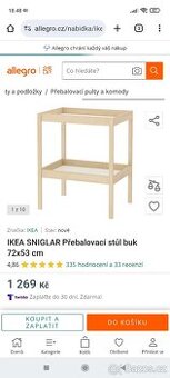 Přebalovací pult s dvěmi podložky.