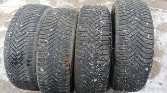 195/65 R15 91T  , čtyři zimní pneumatiky Laufenn
