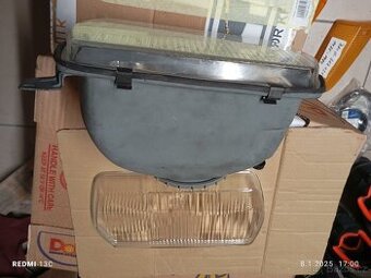 Přední světlo, světlomet a sklo Volkswagen Passat.