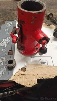 Držák-skříň náhonu Mf-70