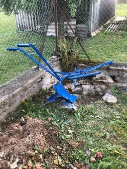 Zemědělský stroj.