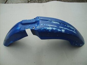Přední  blatník plast.