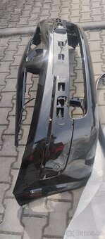 Renault Megane II- přední nárazník Nový  originál v černém l