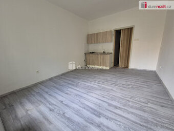 Pronájem 1+kk 23m2 Praha 10 Vršovice činžovní dům nezařízený