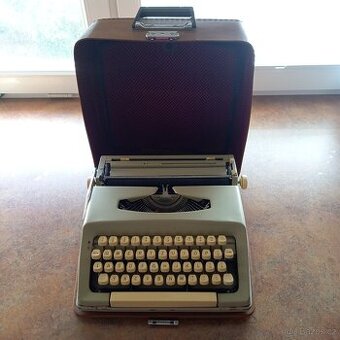 Kufříkový psací stroj