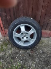 Prodám alu disky s pneu - 1