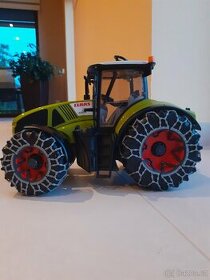 Bruder traktor se sněžnou frézou a řetězy - 1
