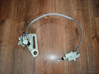 Zadní brzda komplet KTM