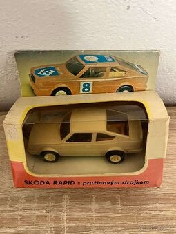 Č.1 IGRA   ŠKODA RAPID S PRUŽINOVÝM STROJKEM