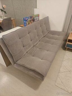 Rozkládací pohovka - textilní šedá