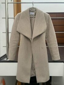 Zimní dámský béžový prošívaný kabát - 1