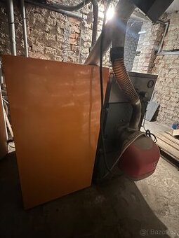 Litinový kotel na dřevo a pelety