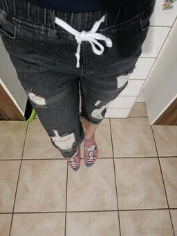 Nové 3/4 džíny velikost M