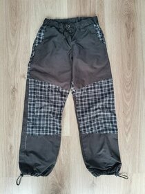 Dětské šusťákové kalhoty vel. 134