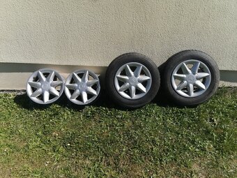 Originalní Škoda hliníkové disky + zimní pneu na Felicii