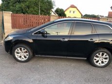 mazda cx7 - díly z celého vozu