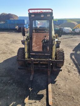 Smykový nakladač locust 752