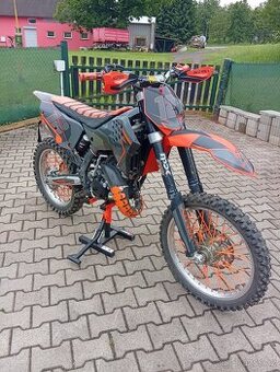 Prodám KTM 144 sx, rok 2008 ,nový olej, destičky, ložiska v