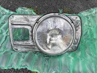 světlo originál škoda 105 120 kulaté s plechem levá strana