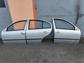 Dveře Octavia 1 sedan - stříbrné 9102