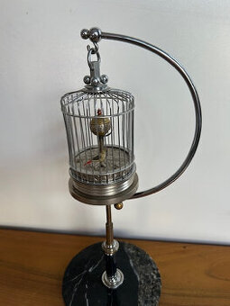 Stolní hodiny - ptáček v kleci.